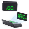 Black heads-up display unit showing green 38 speed digits on screen
