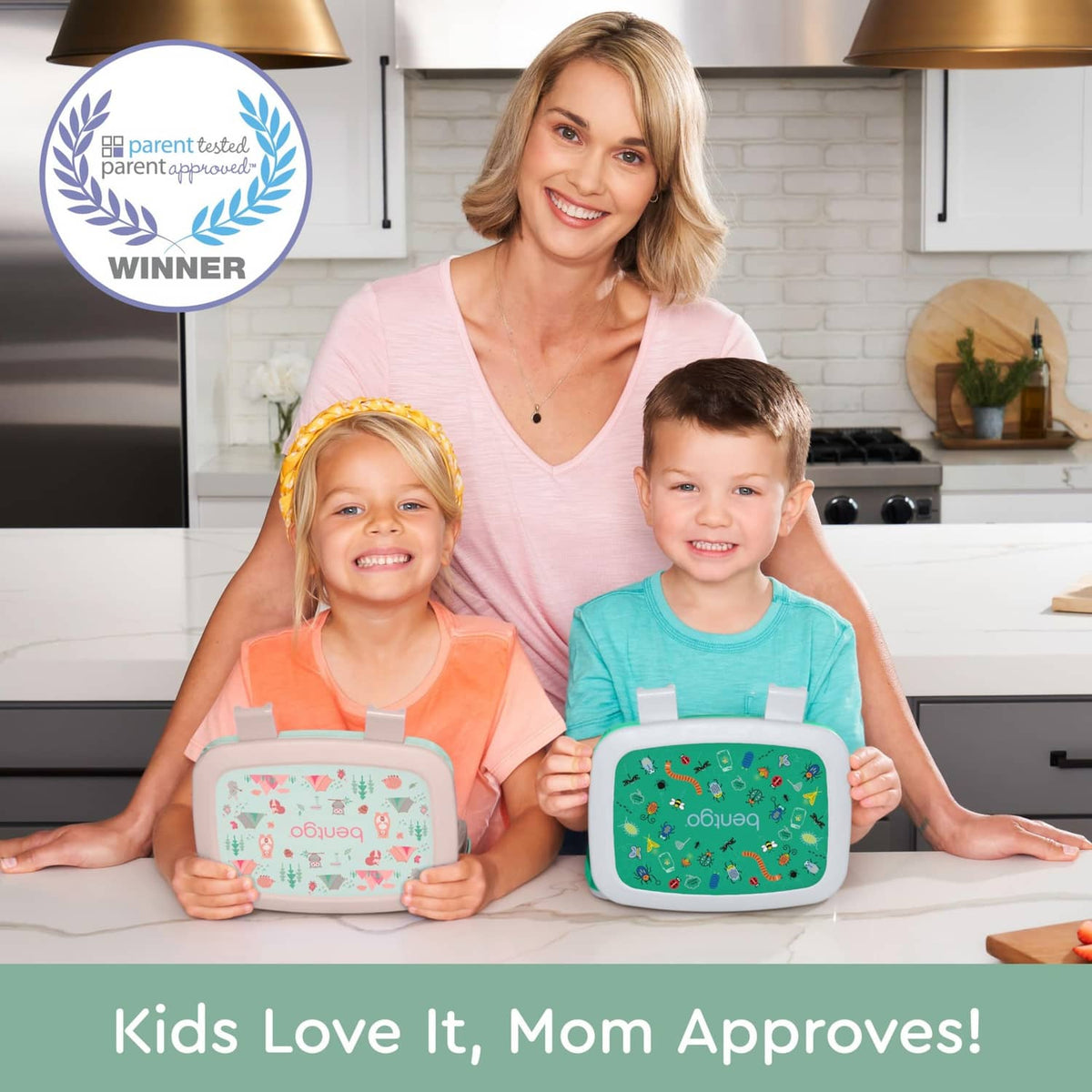 Bentgo kids lunch box with mint-green lid and animal print, held by two children