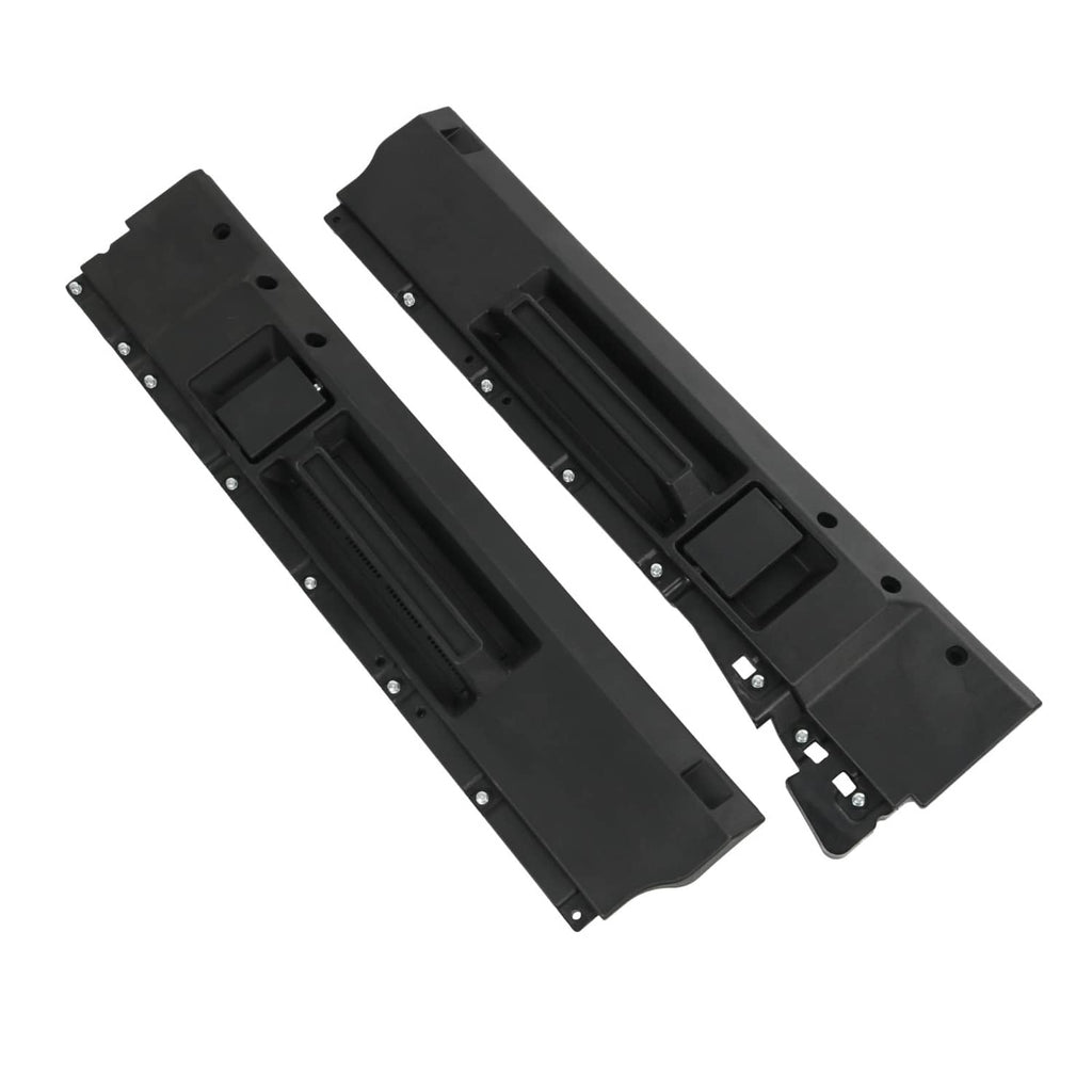 Black interior door handle trim plates with rectangular openings and mounting rivet points