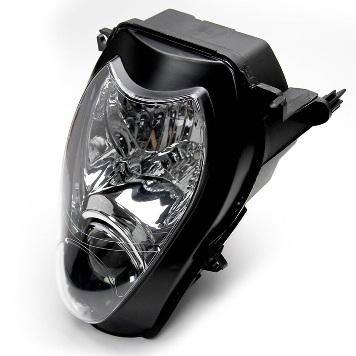 Motorcycle headlight assembly angled view with clear lens and black outer housing