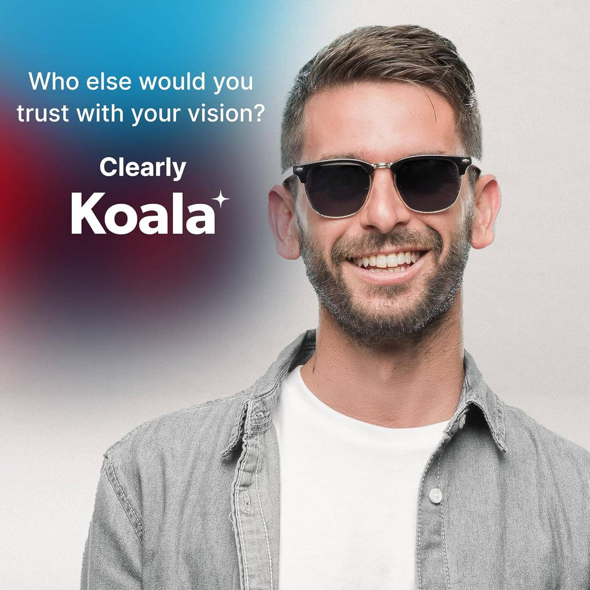 Man wearing dark sunglasses with reflective lenses, smile.