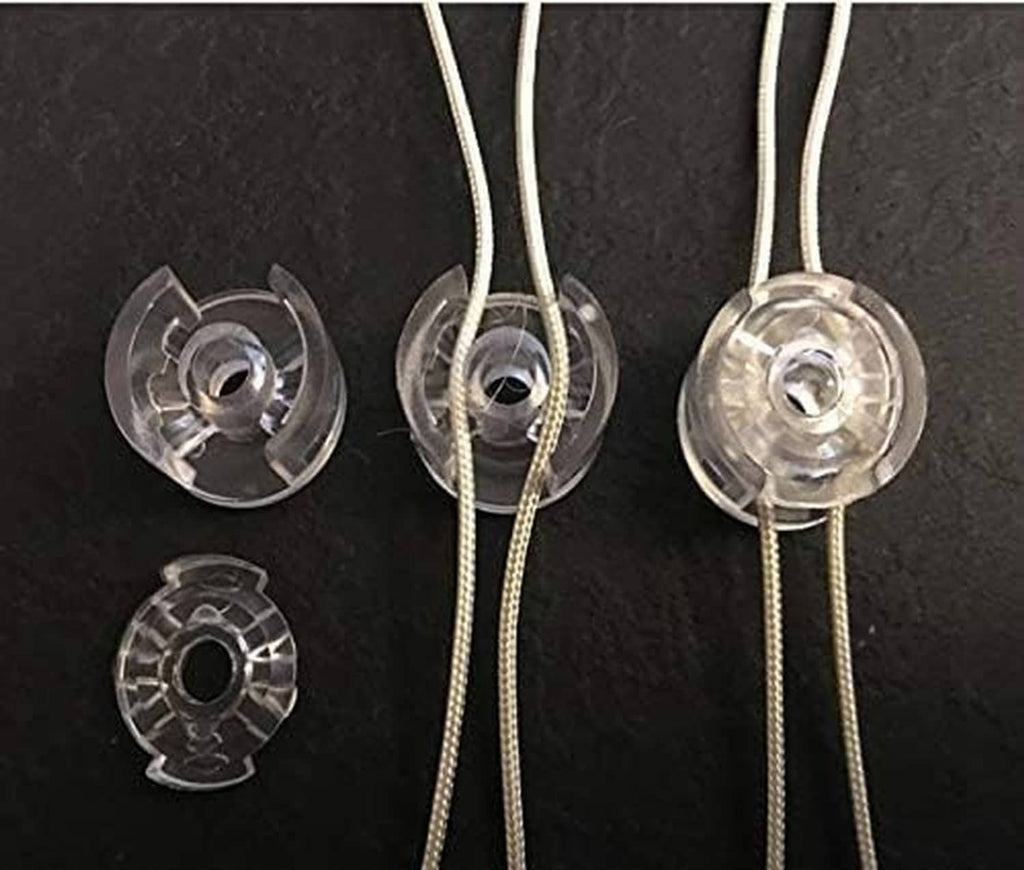 Clear cord tensioner clips with metal inserts, for roller shade cords