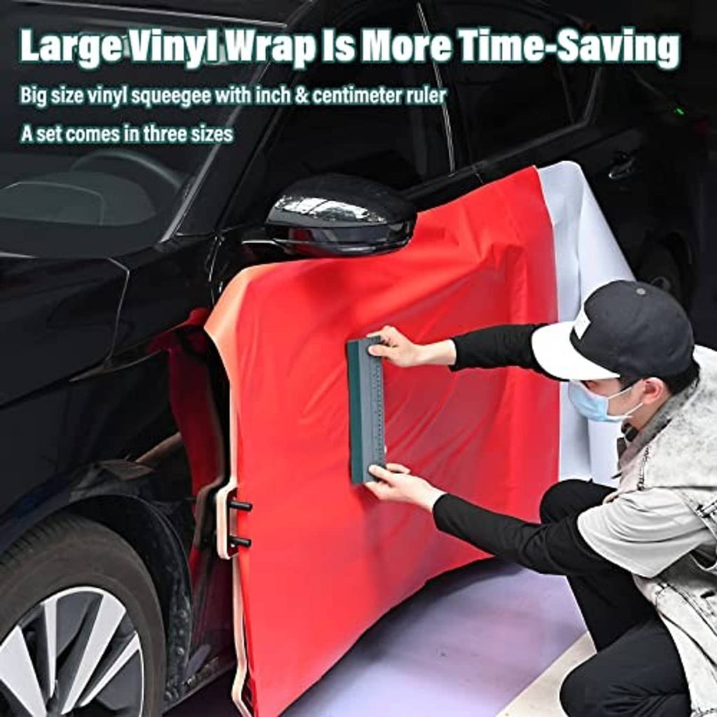 Large vinyl wrap squeegee with gray ruler and dark felt edge for smoothing.