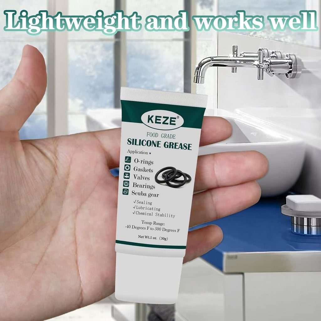 KEZE silicone grease tube held near sink faucet, white tube with green top