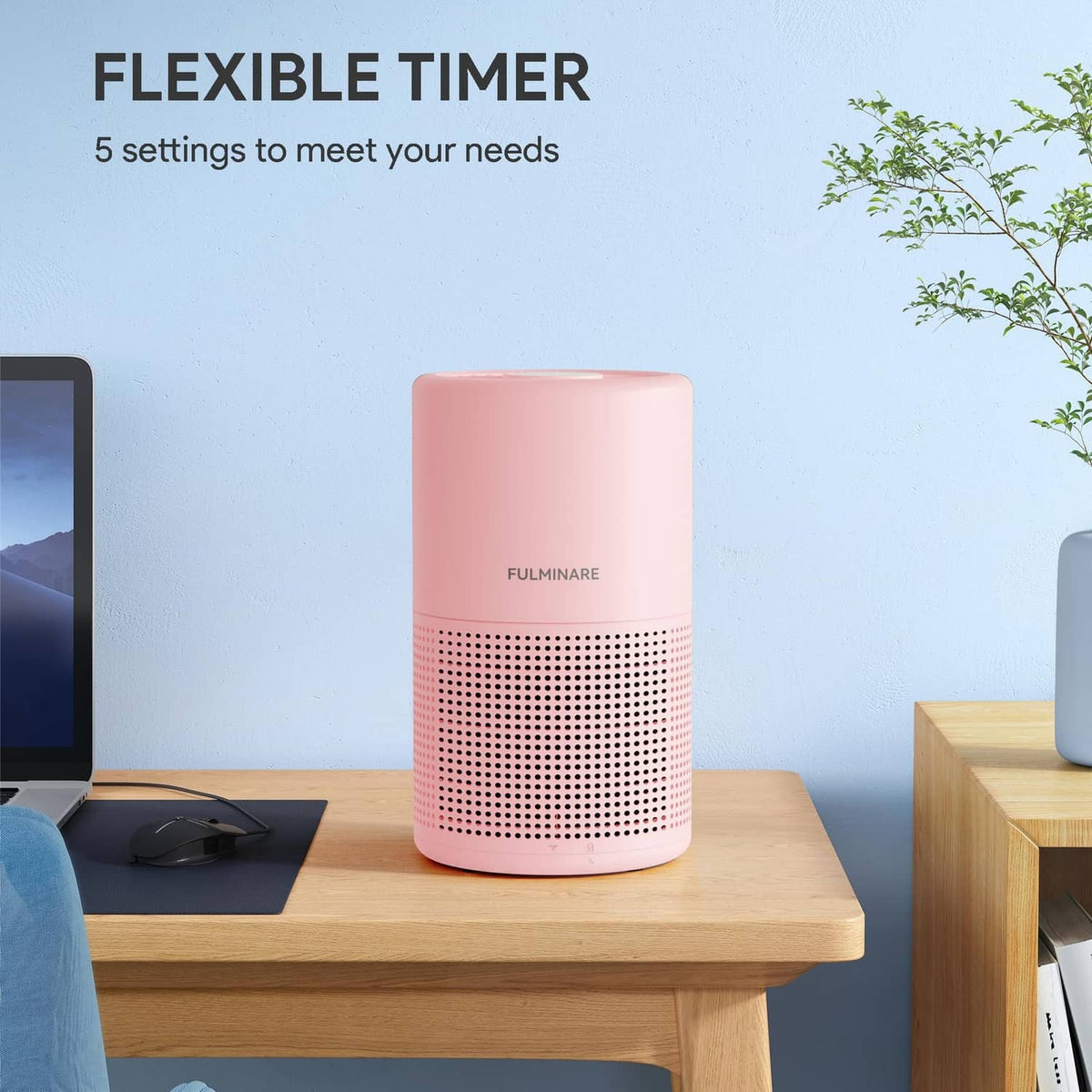 Pink cylindrical air purifier with vented lower grille and top control panel