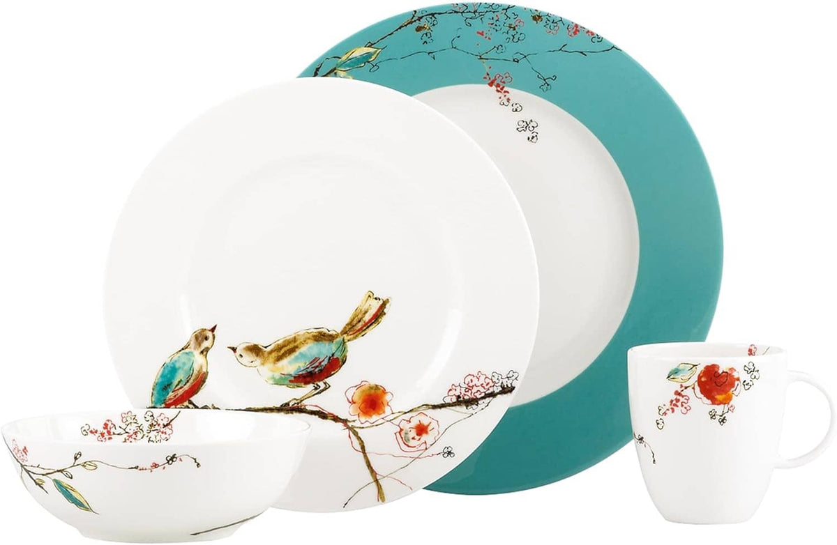 Bird-and-floral 4-piece place setting: dinner plate, teal plate, bowl, mug