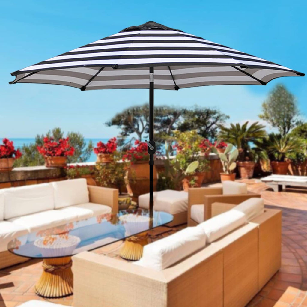 Outdoor patio umbrella with navy-and-white striped canopy and sturdy black stand