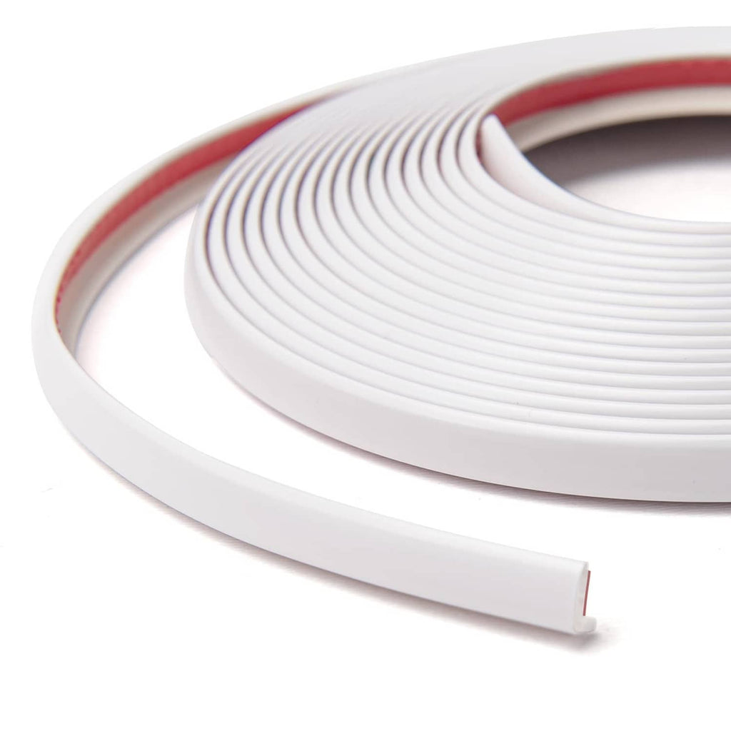 Close-up of white vinyl outside corner trim tape roll with peel-and-stick edge
