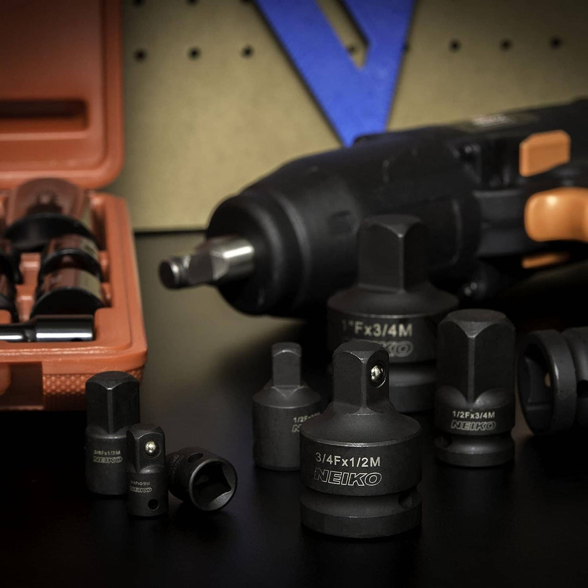 Impact socket adapters in use with a drill, with multiple black NEIKO size couplers