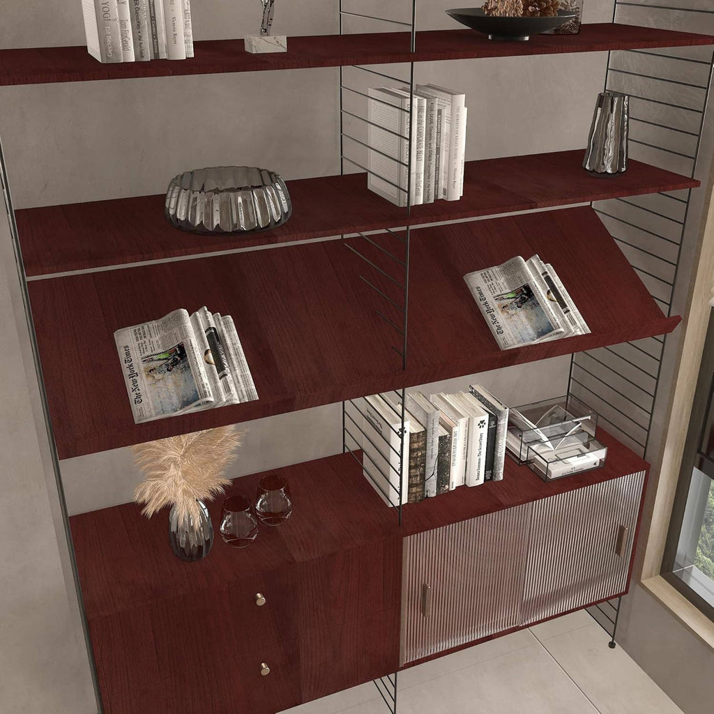 Red-brown cherry wood contact paper on built-in shelving, woodgrain finish
