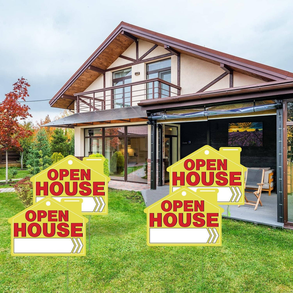 Open house yard sign set with red OPEN HOUSE text on yellow boards and stakes