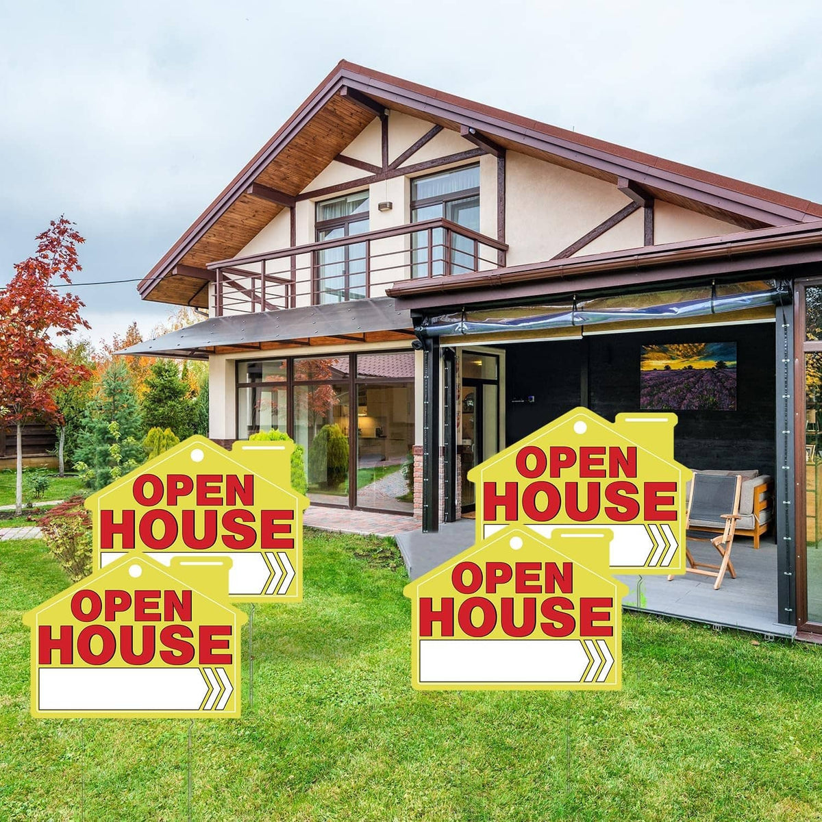 Open house yard sign set with red OPEN HOUSE text on yellow boards and stakes