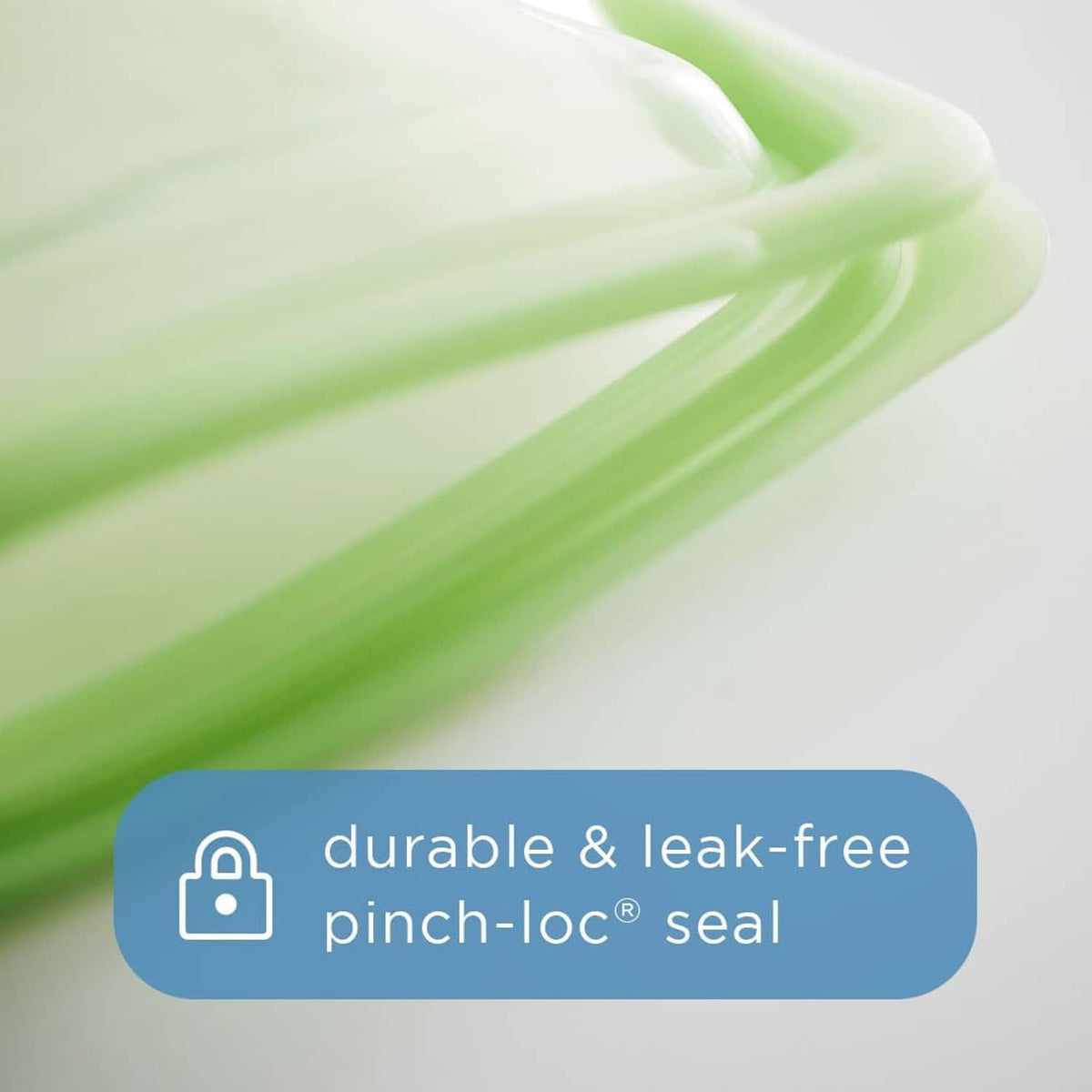 Reusable silicone bag lid close-up showing pinch-lock seal, translucent green tint