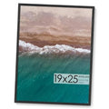 Black wood picture frame with colorful landscape print, size 19x25.