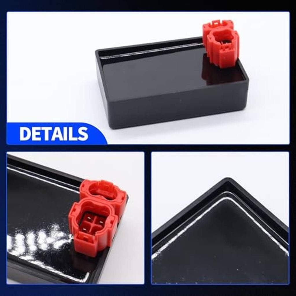 Black CDI module box with red connector plug and glossy internal wiring channel