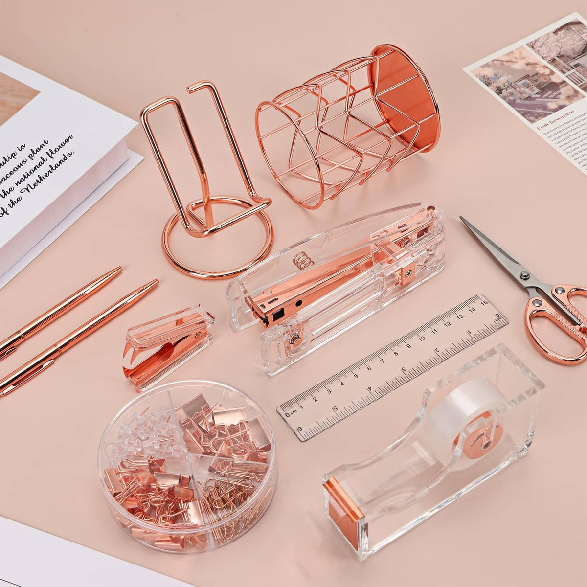 Rose gold desk accessory set with tape dispenser, scissors, binder clips, and heart organizer