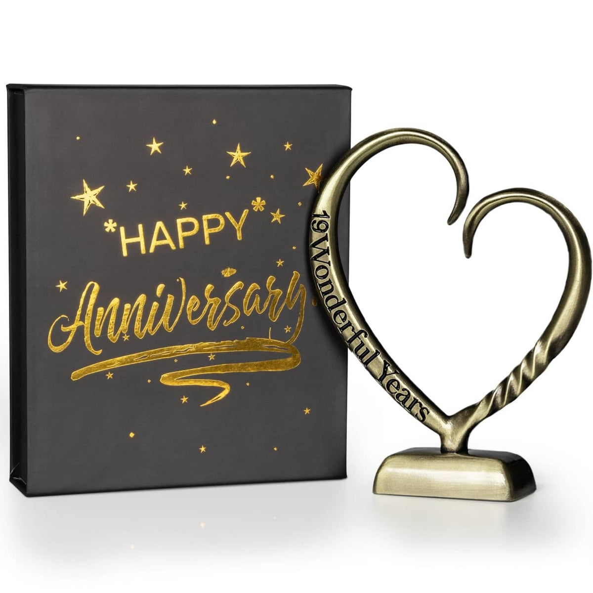 Bronze heart anniversary sculpture beside a gift box
