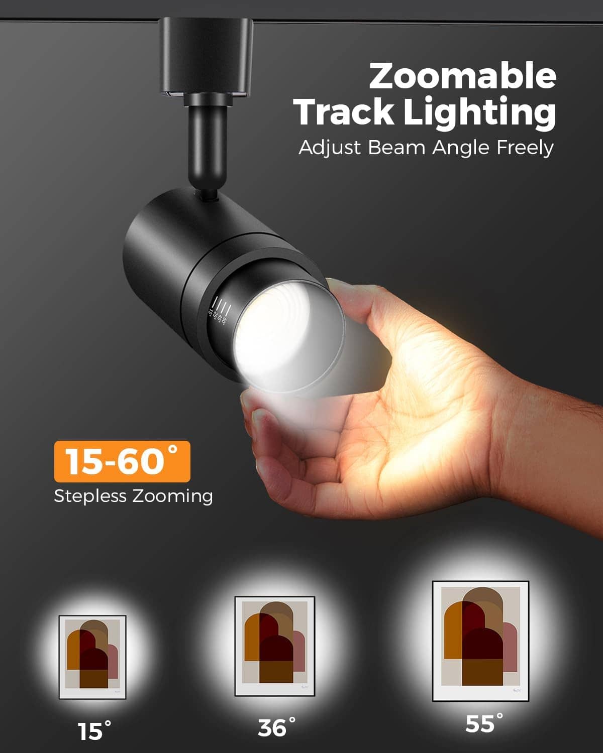 Black zoomable track light head with warm LED lens, hand adjusting beam direction