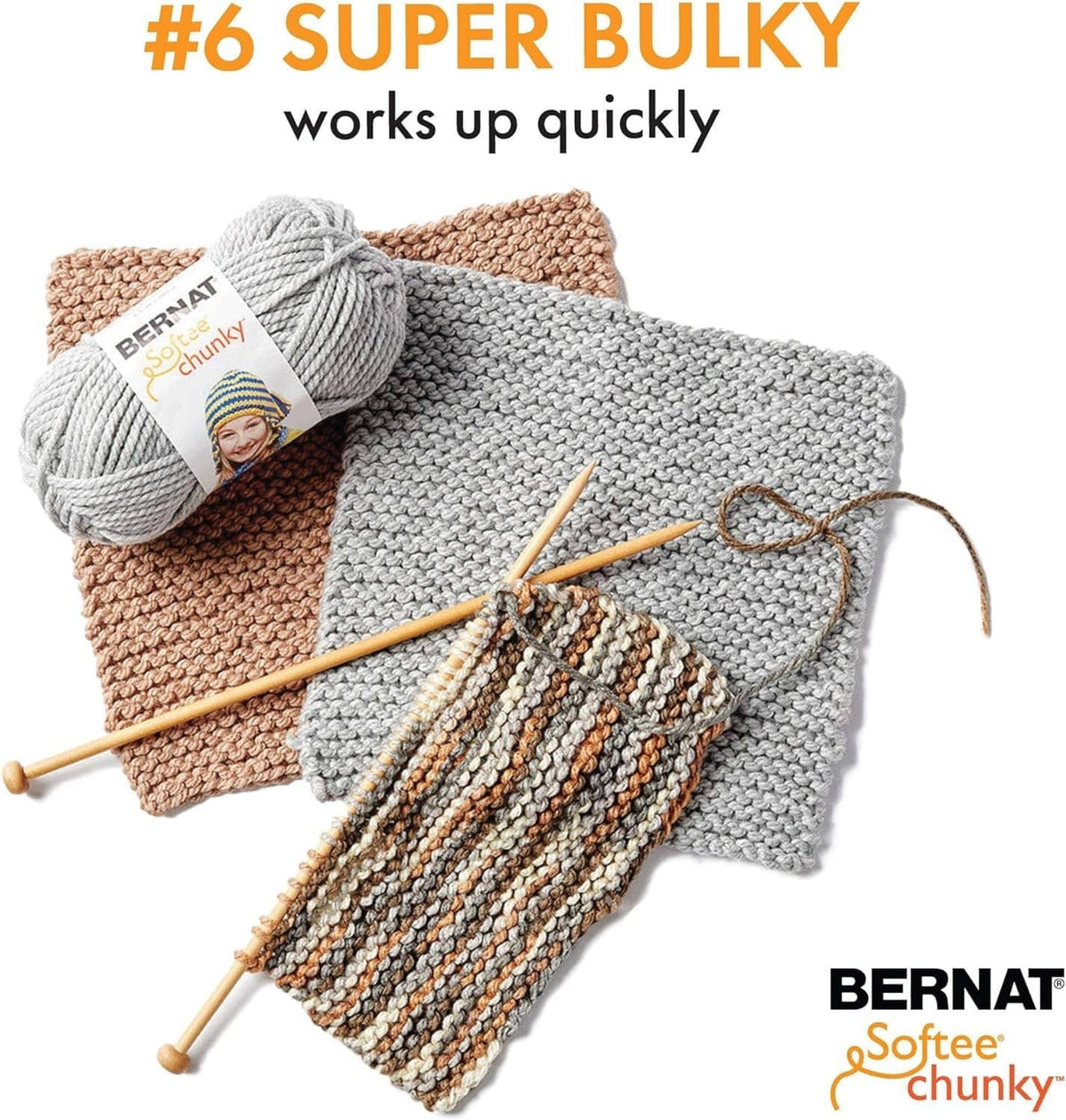 Super bulky yarn bundle with knit swatches and gray and tan skeins