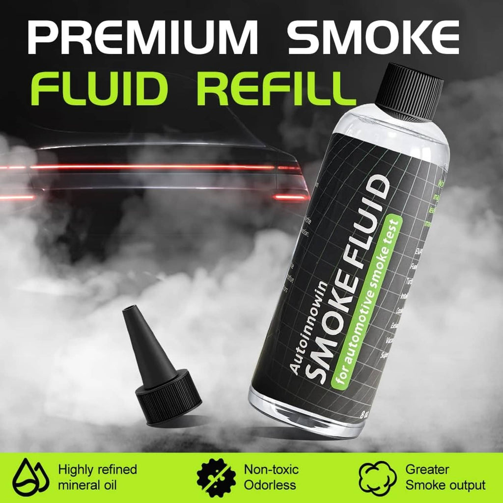 Smoke fluid refill bottle with green label, shown on its side with nozzle
