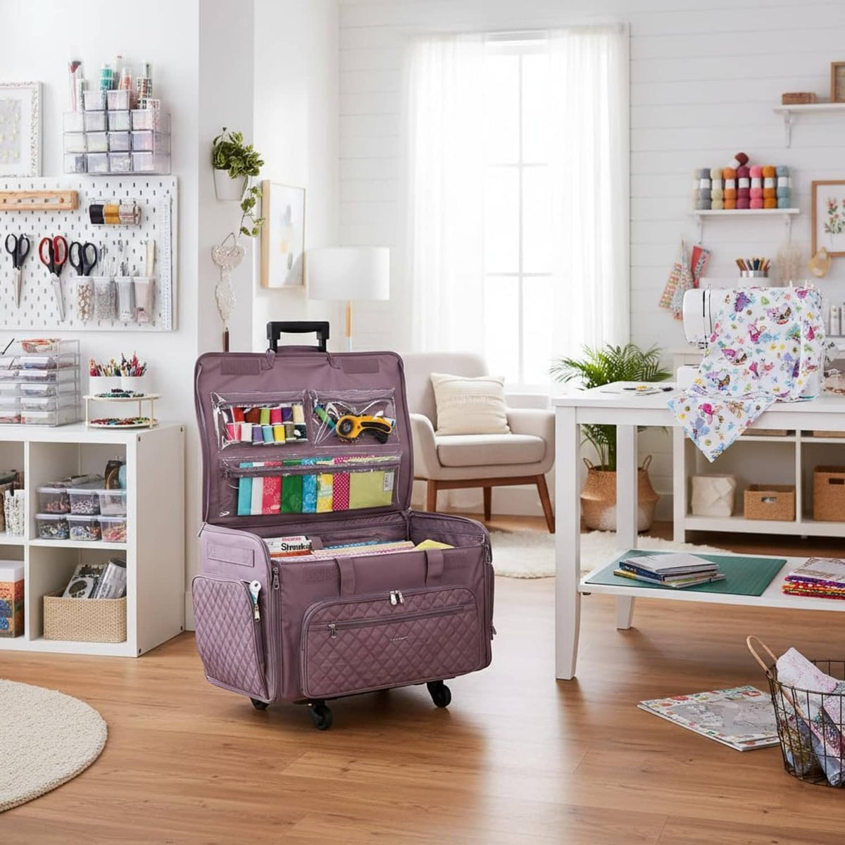 Purple quilted rolling sewing machine case on 4 wheels with carry handle and front pockets