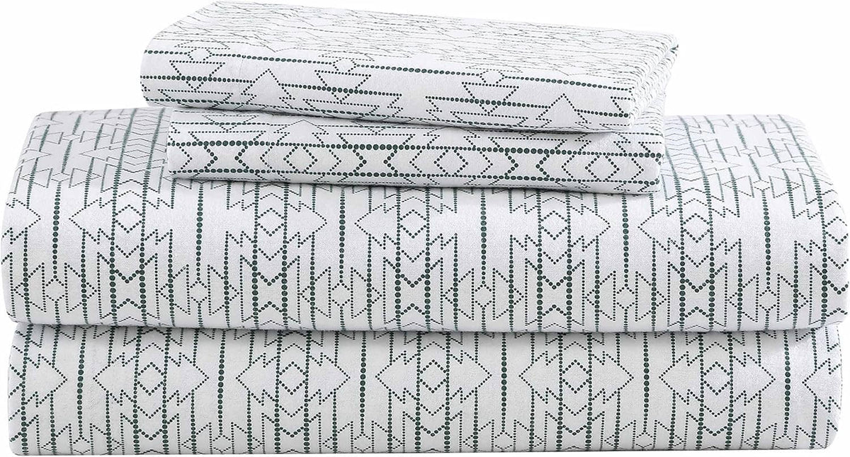 Queen sheet set in white flannel with navy geometric print, folded triple layer