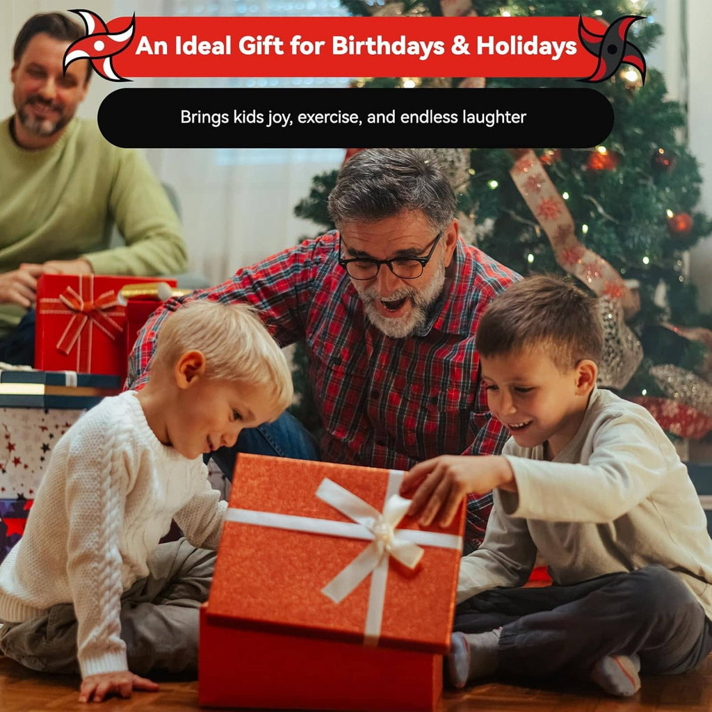 Family kneeling beside a wrapped gift box with a red ribbon during the holidays