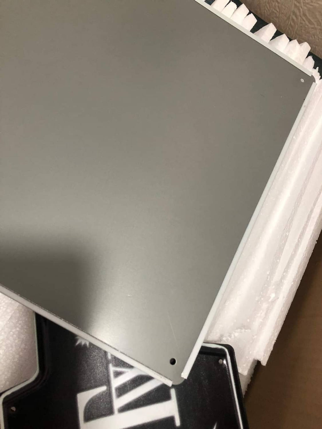 Silver metal tin sign panel with four corner holes and folded edge
