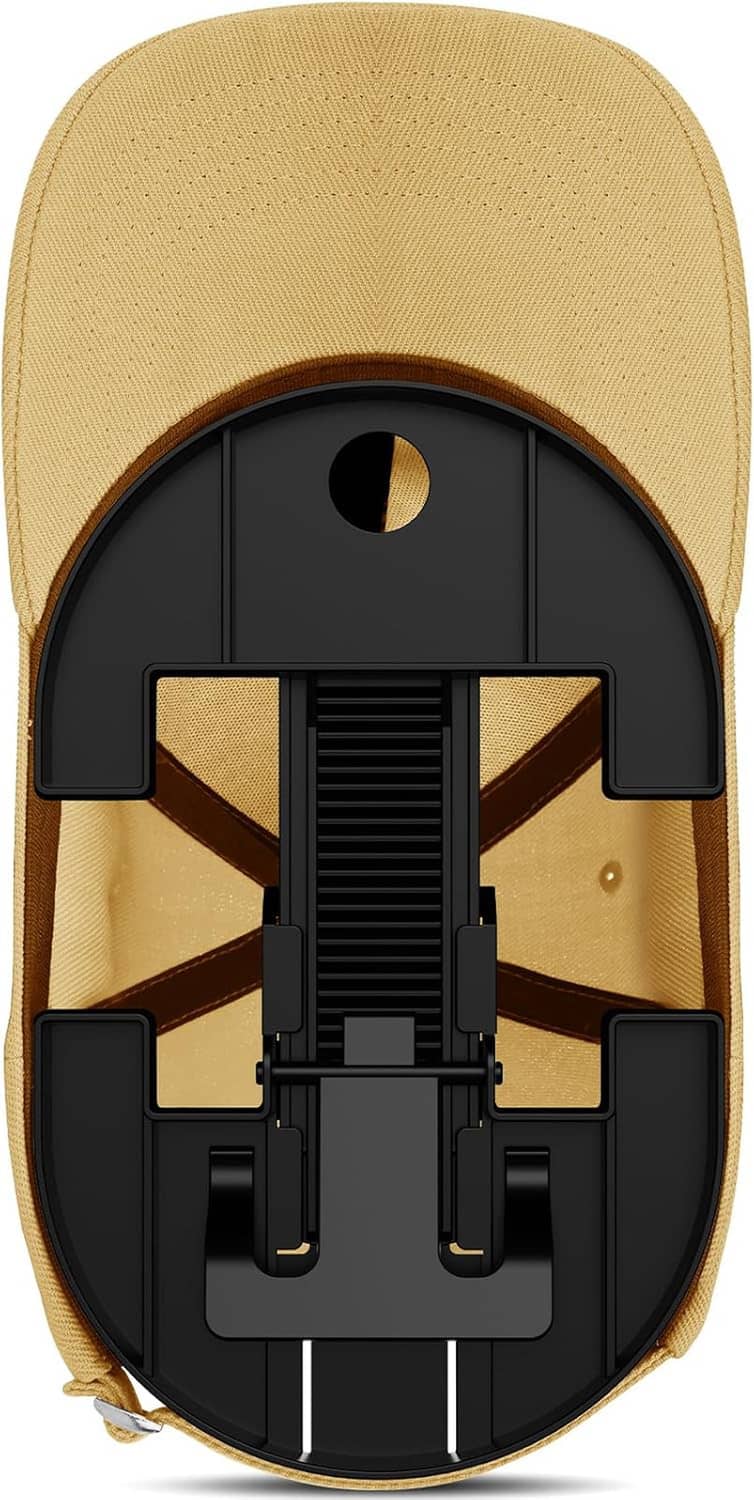 Black adjustable hat stretcher inside a tan baseball cap with side-support arms