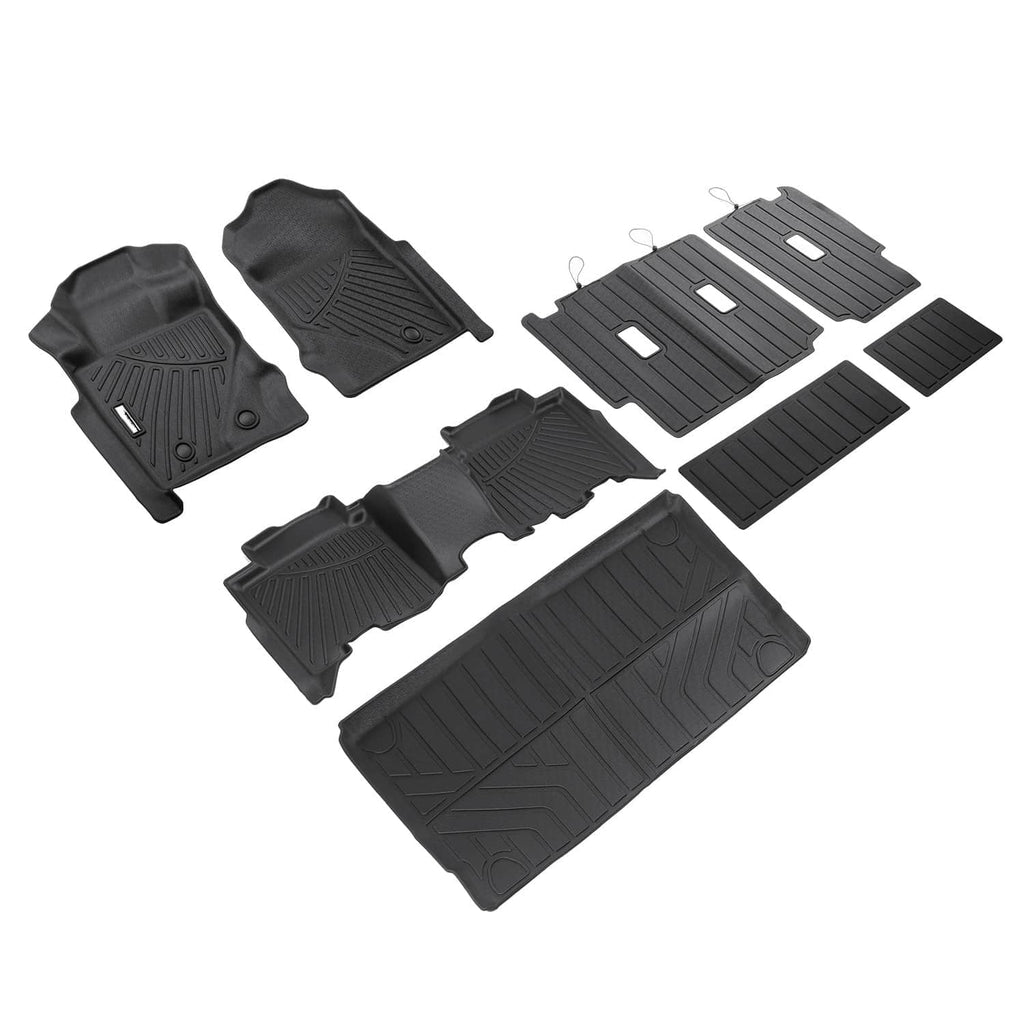 Black 4-door SUV floor mat set with multiple fitted mats and cargo liner panel