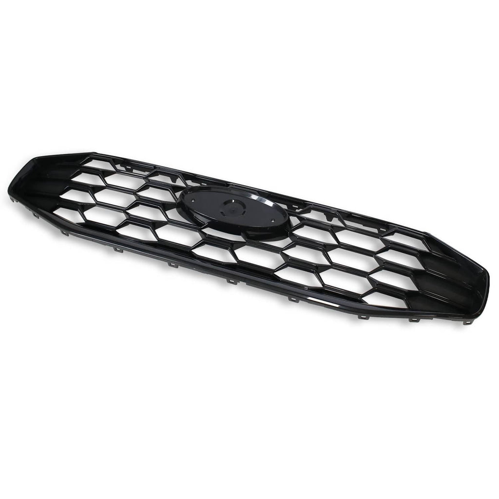 Black grille insert angled view, showing hex mesh and central emblem opening