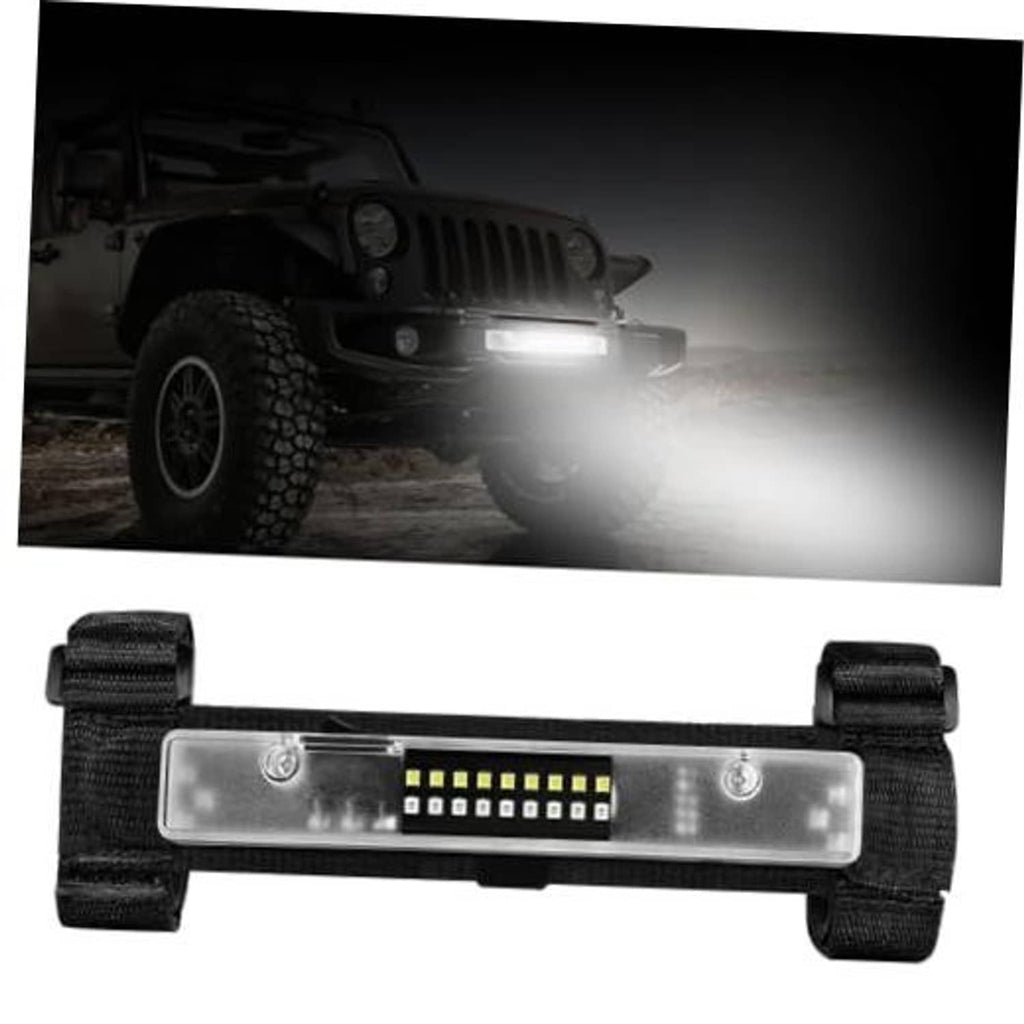 Universal LED light bar with clear lens and black nylon strap mount, switched on