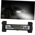 Universal LED light bar with clear lens and black nylon strap mount, switched on