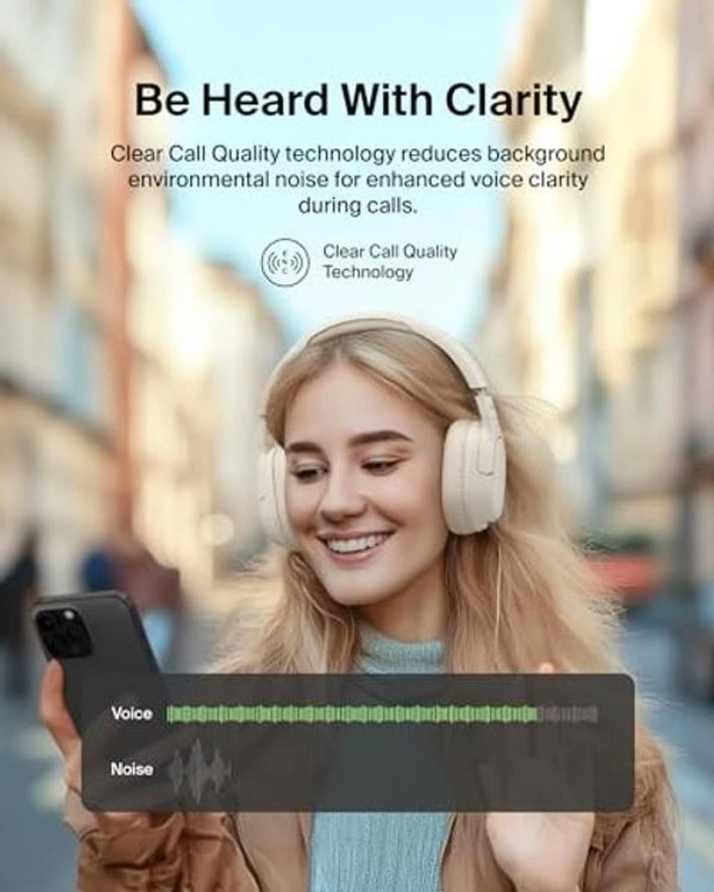 Cream over-ear ANC headphones on a person, with smartphone in hand for listening