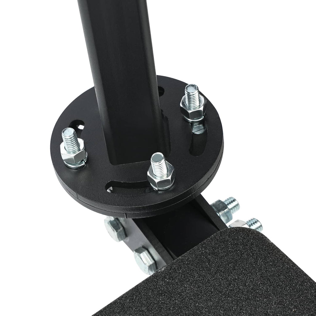 Close-up of black round base plate with bolts and textured step tread