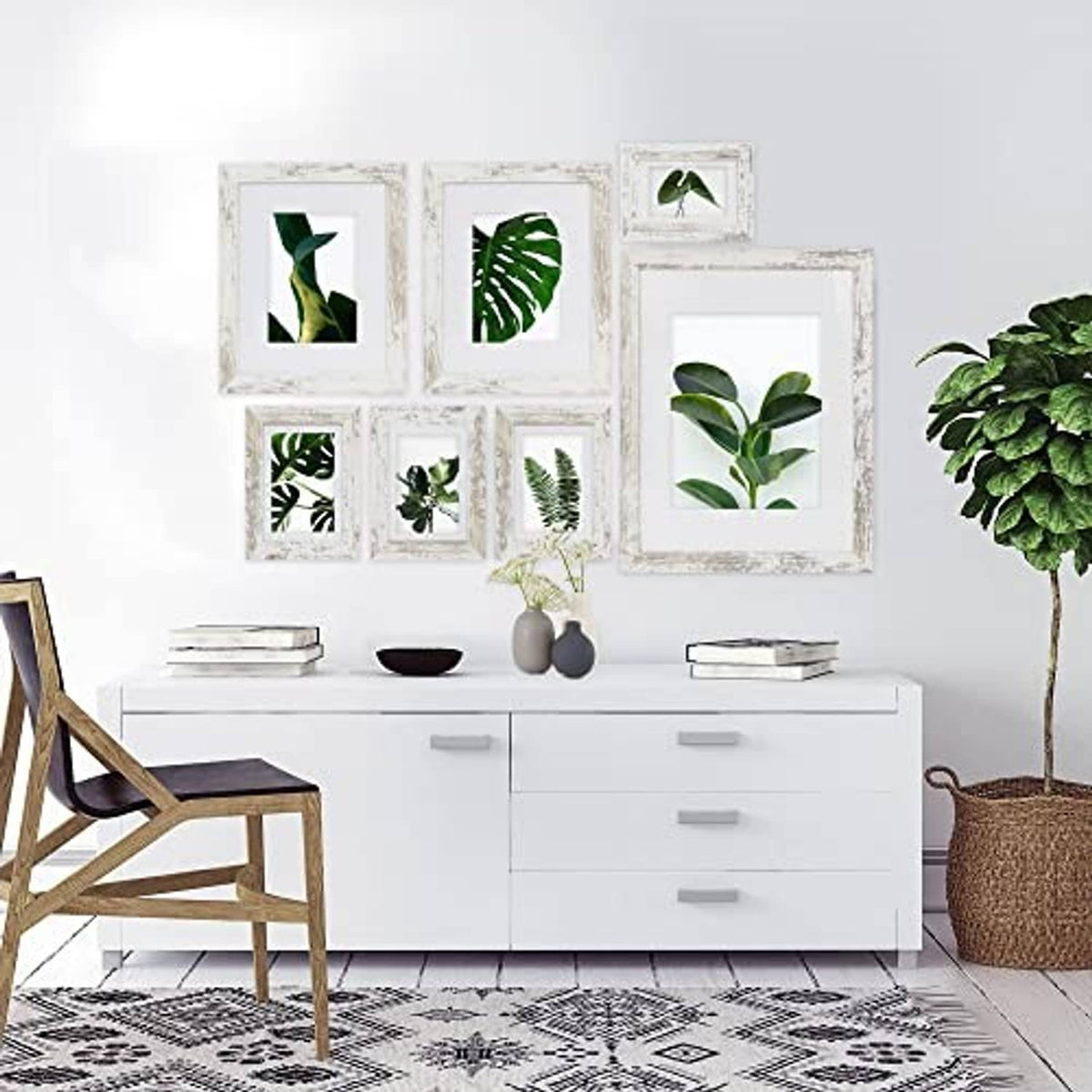 Distressed white 8x10 photo frame set arranged on a wall gallery grid