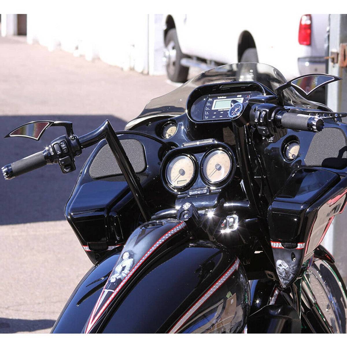 Motorcycle rearview side mirrors installed on fairing, black pair with angled covers