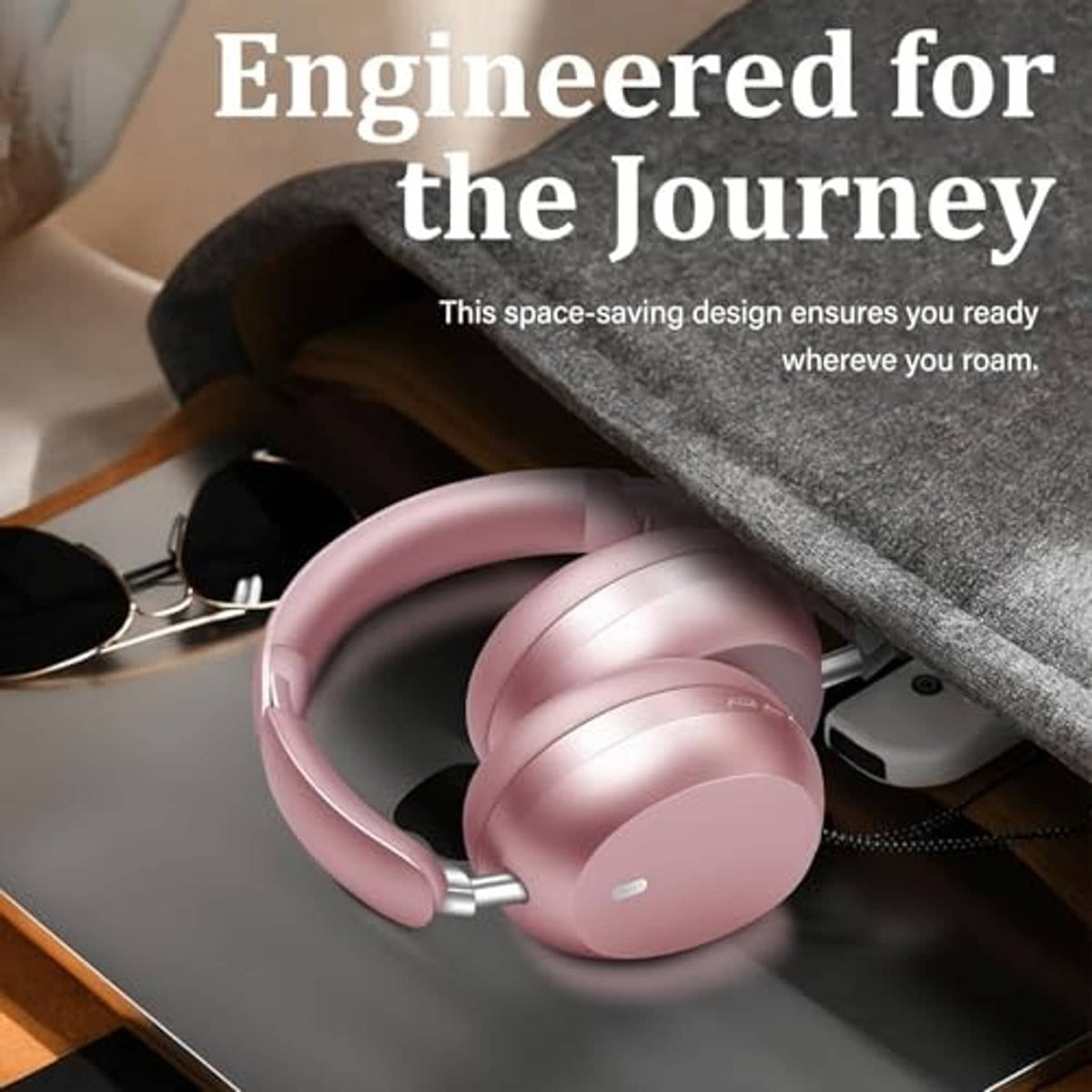 Pink wireless over-ear headphones with foldable design for compact storage