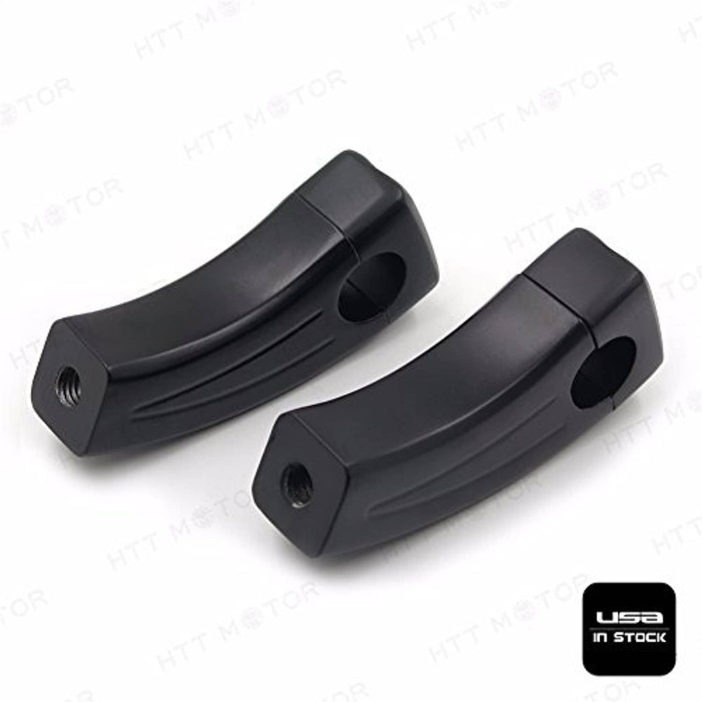 Black handlebar riser block pair with round opening and front sculpted channel details