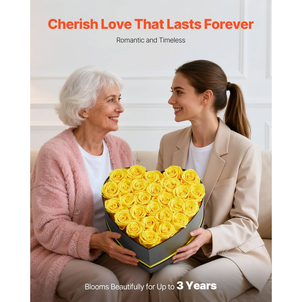 Heart-shaped black box of yellow preserved roses with yellow ribbon, held as a gift