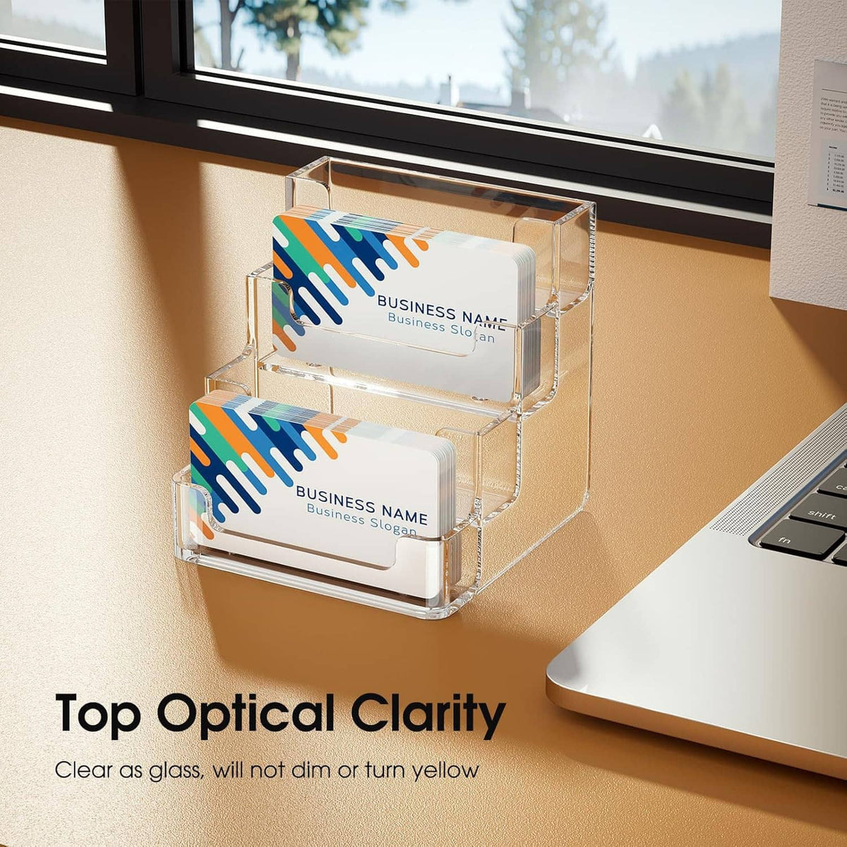 Transparent acrylic business card holder with colorful cards stacked in tiers