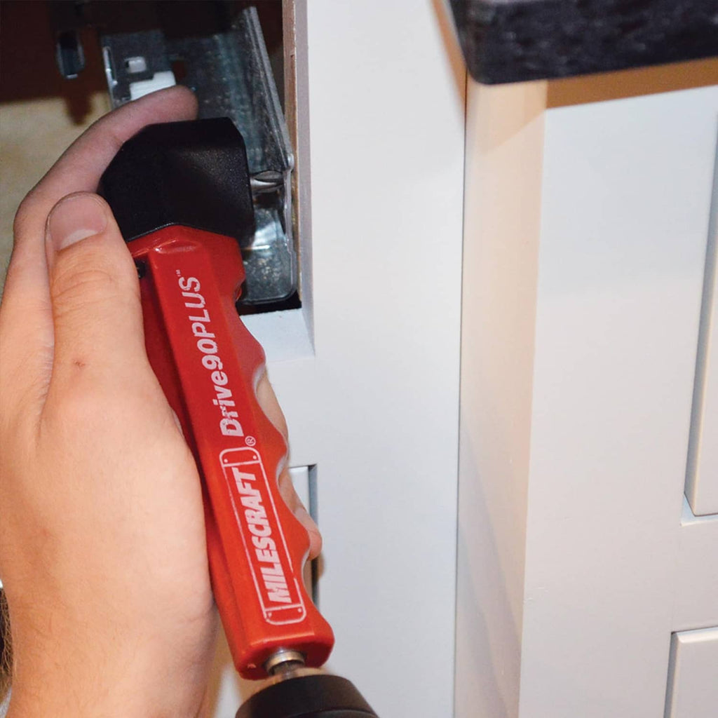 Milescraft right-angle drill attachment in use, red housing with black angled head