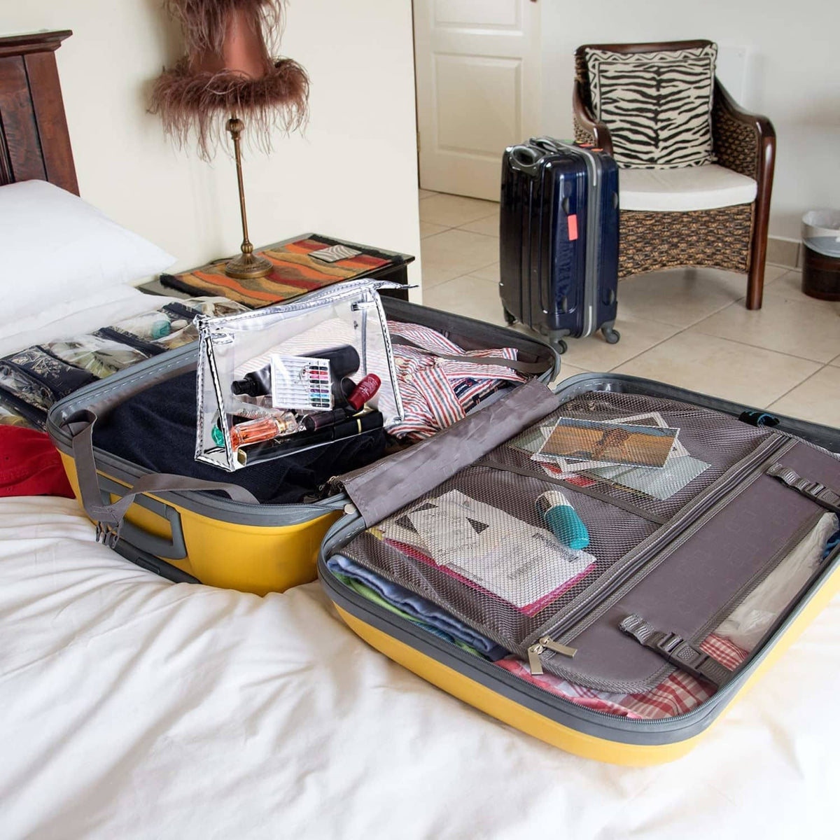 Travel sewing kit organizer laid open with needle accessories and compartments