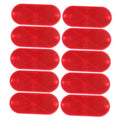 Set of 10 red oval road reflectors with textured surface and two mounting holes