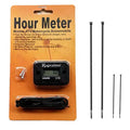 Inductive hour meter with dark housing, LCD display, and two mounting wire leads
