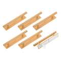 Set of six light wood-grain plastic push-pull door helpers with self-stick backing