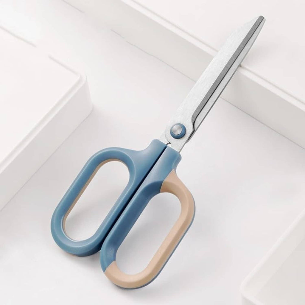 Craft scissors with light blue handle grips and silver blades, shown angled