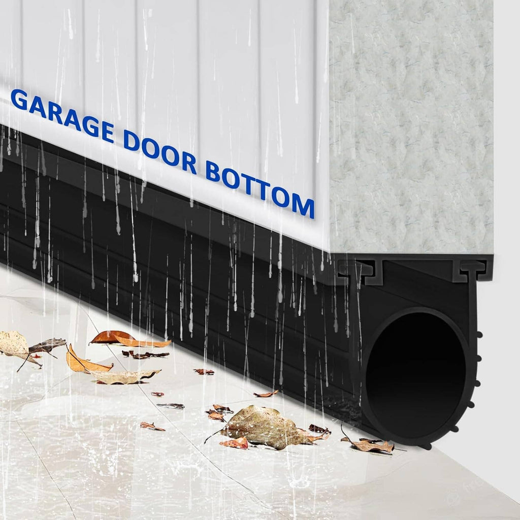 Black round-bulb garage door bottom seal helping block rain and debris at base