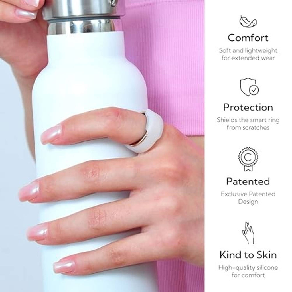 White silicone smart ring protector worn on a finger, covering the ring snugly
