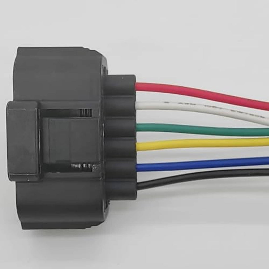 Wiring harness connector with black housing and red, white, green, blue wires